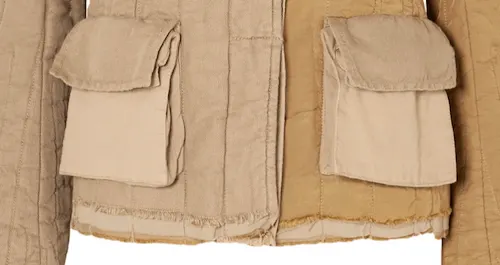 Close up photo of a beige accordion style type of pocket with flat