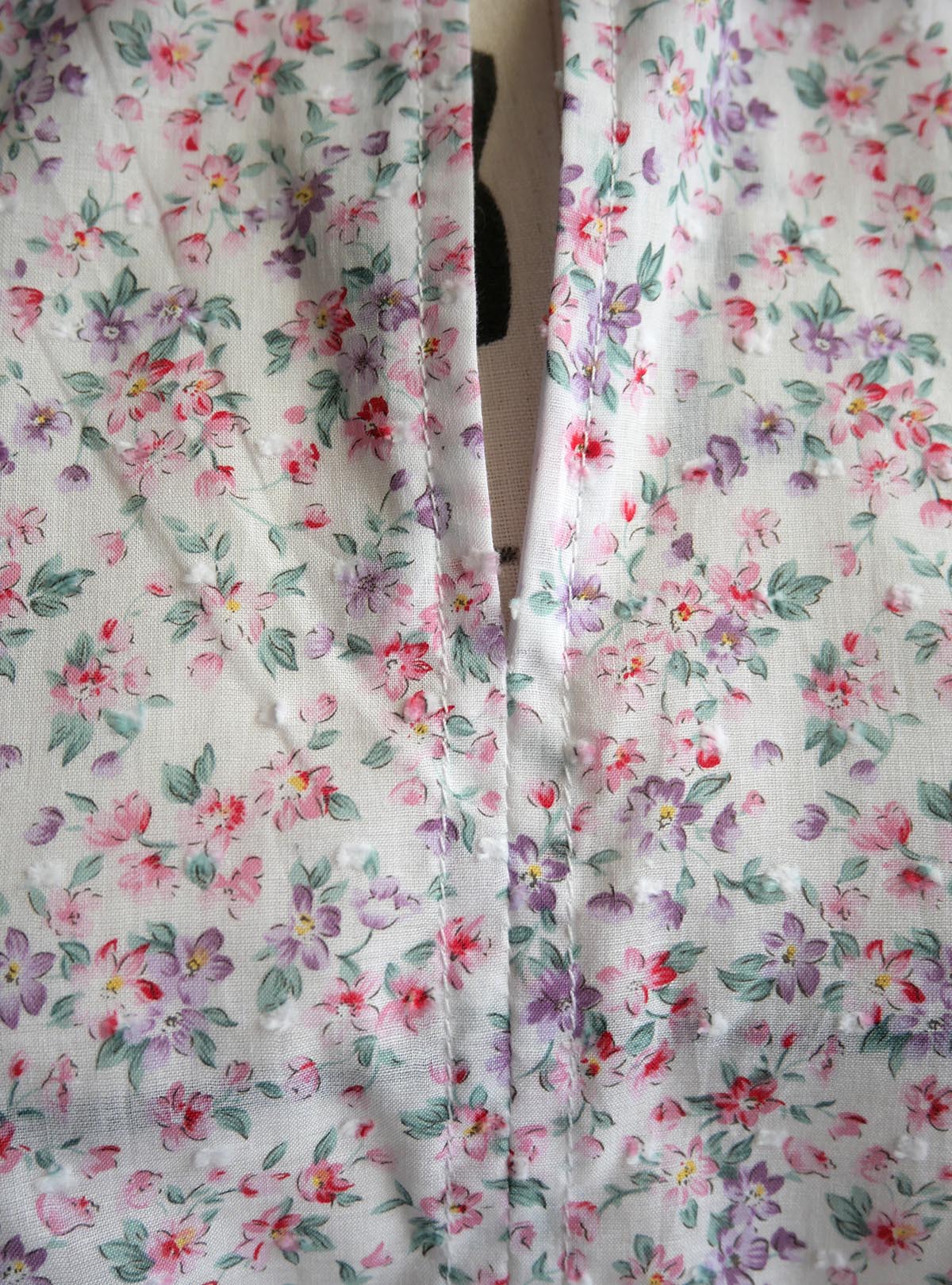 Topstitching on a ditsy floral top