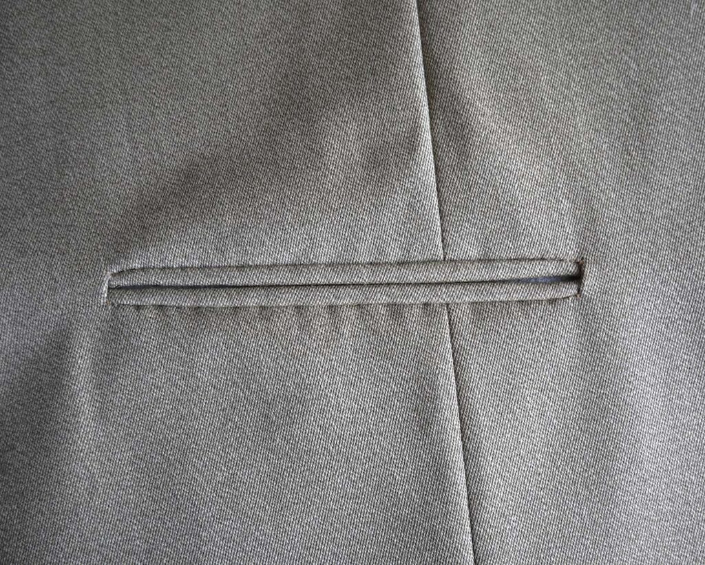 The jets and secured into place with hand stitching.