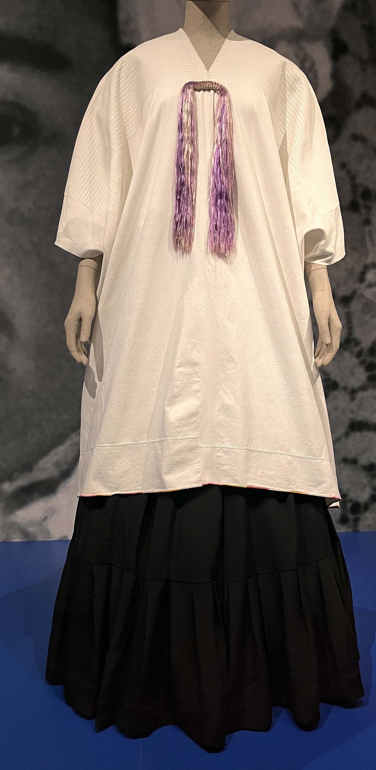 A simple white huipil worn by Frida on her deathbed