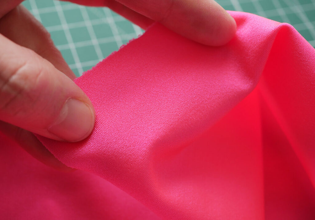 4 way stretch in the knitted stretch satin fabric