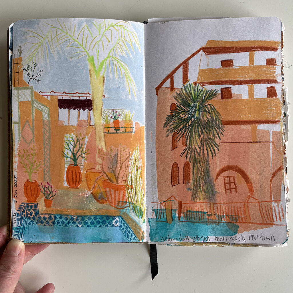 Drawing in Morocco - the Riad on the left, and a street building on the right