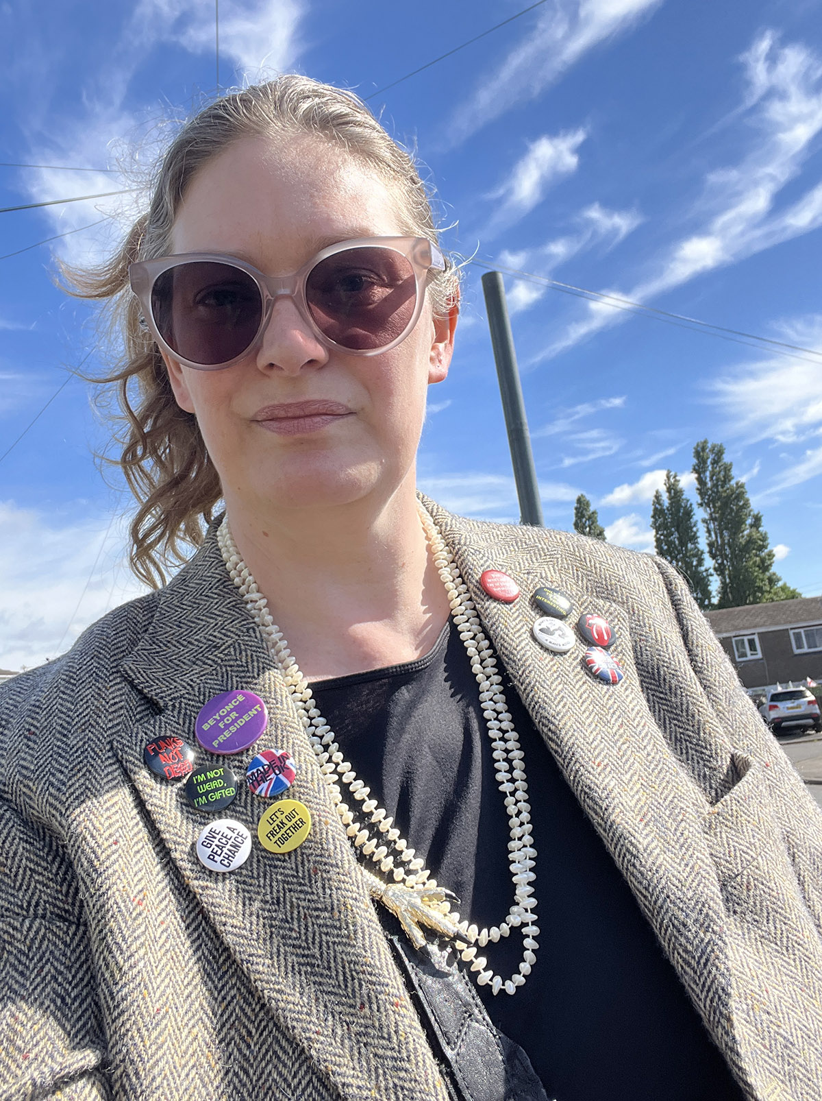 Eve in a thrifted tweed blazer