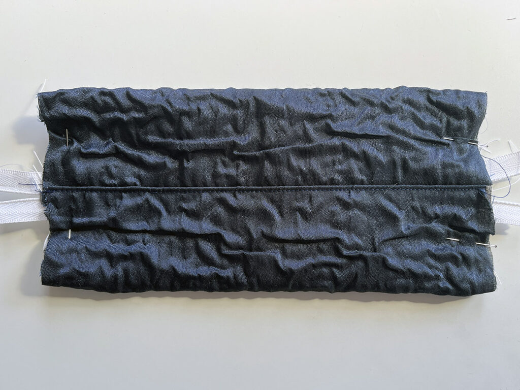 Center the zipper in the middle of the DIY pencil case