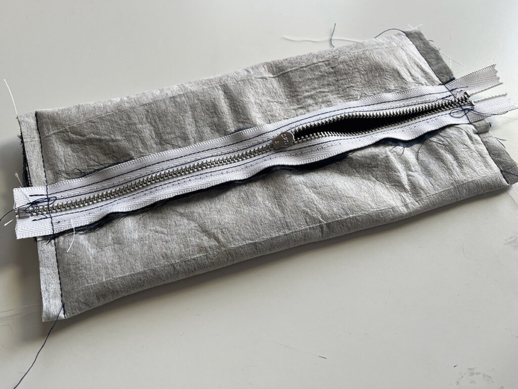 Make sure the zipper is open before sewing the final short edge of your DIY pencil case!