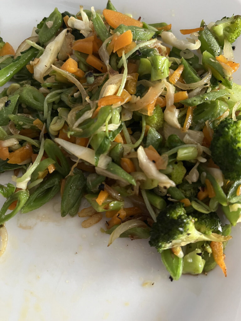 Fresh homegrown veggies in a home cooked stir fry