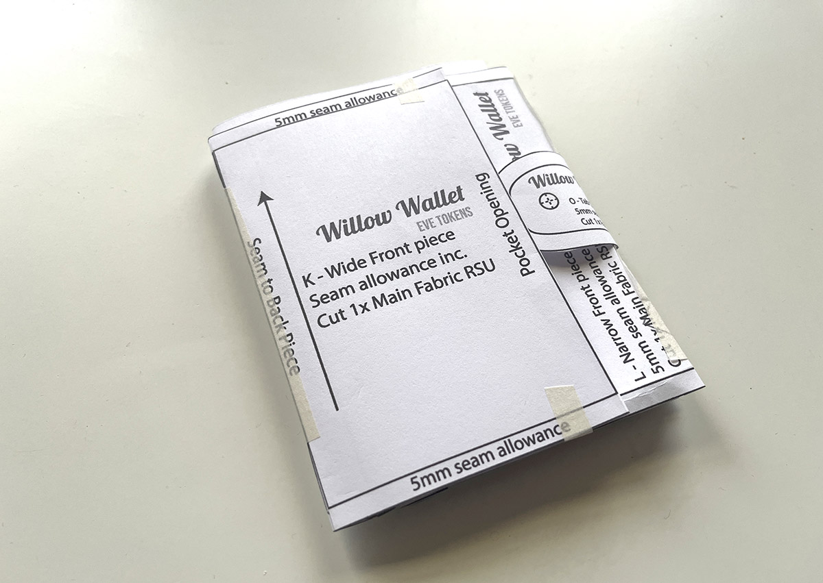 A paper maquette of the Willow Wallet which is a bi-fold wallet pattern in development