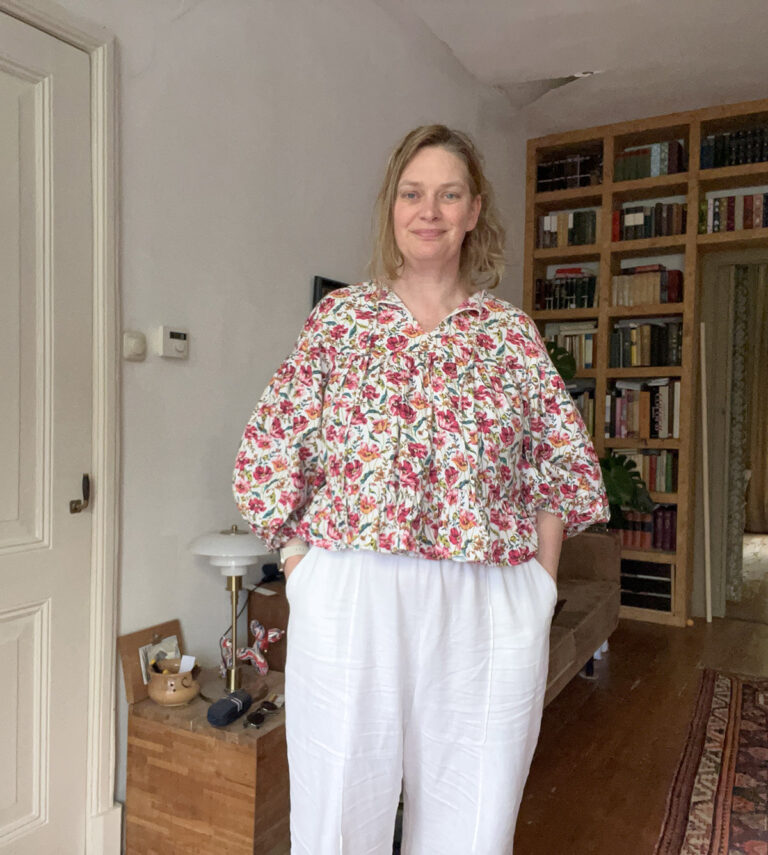 Eve wearing the Hazel Dress cut down as a top