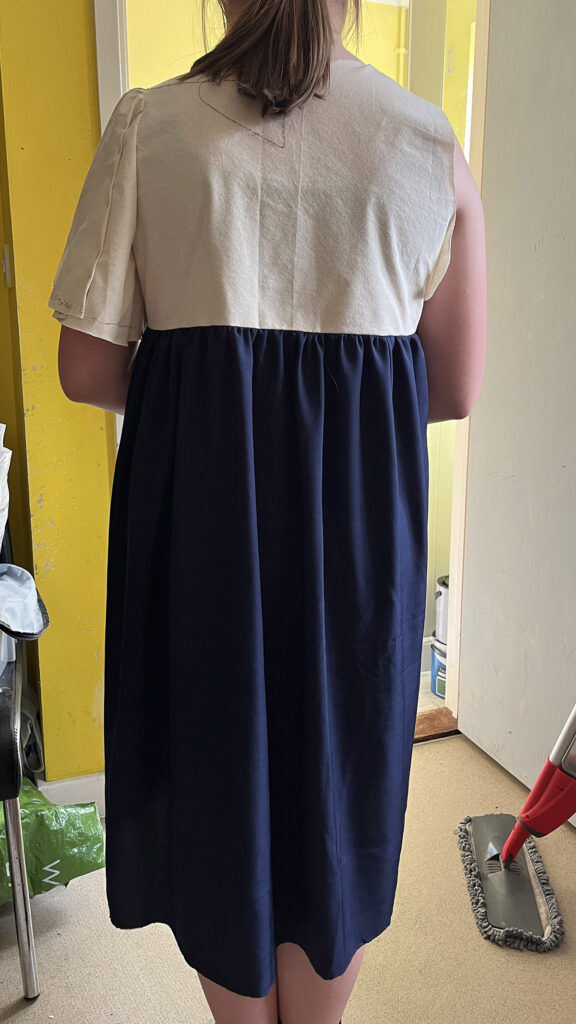 Back view of Sophie in her bridesmaid dress toile
