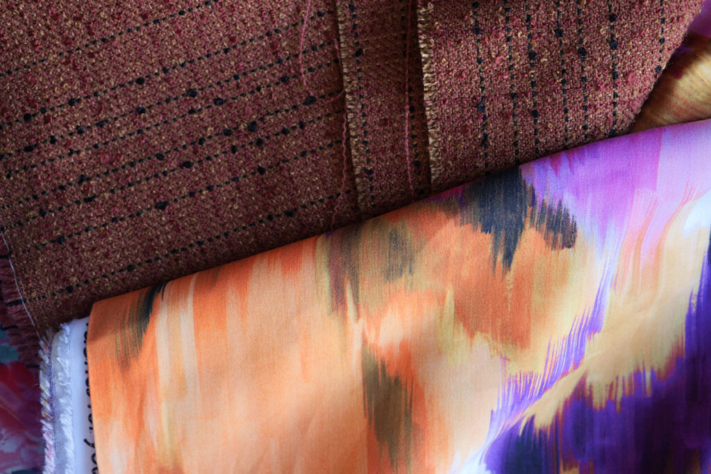 The abstract drapey fabric with orange woven fabric