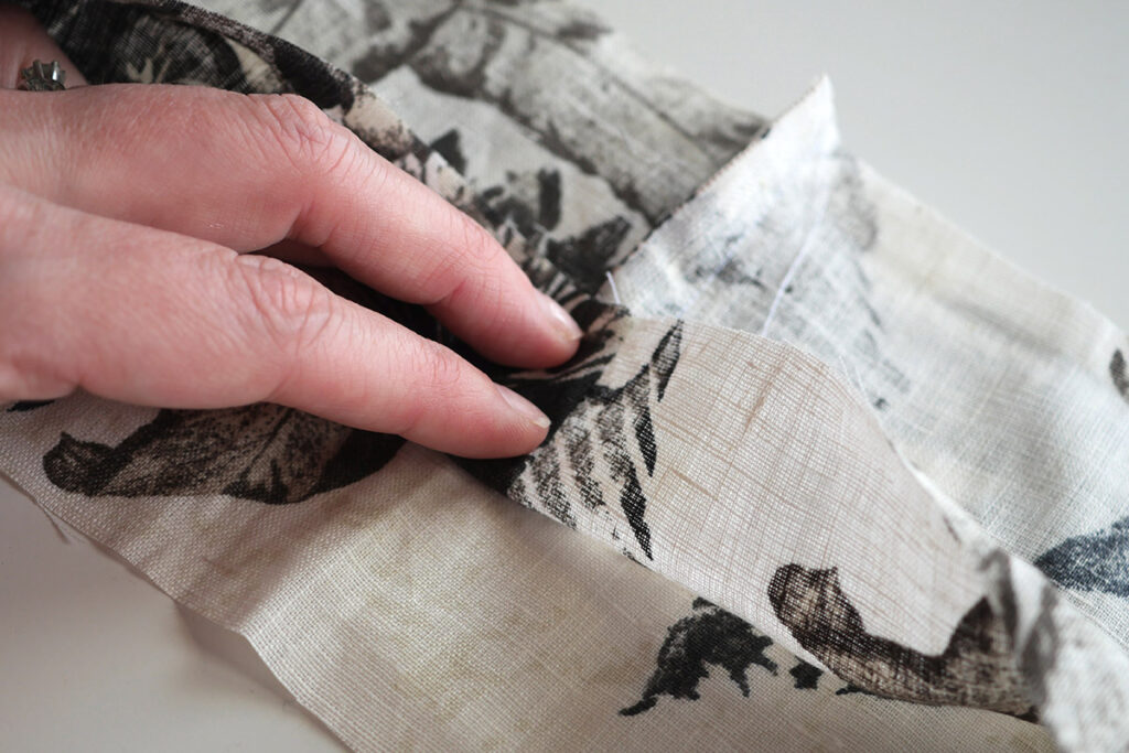 Move the seam to the middle of the fabric length