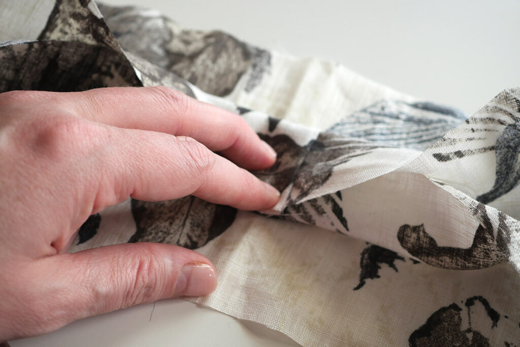 The upper section is folded into three so make it narrower for sewing closed using the burrito method